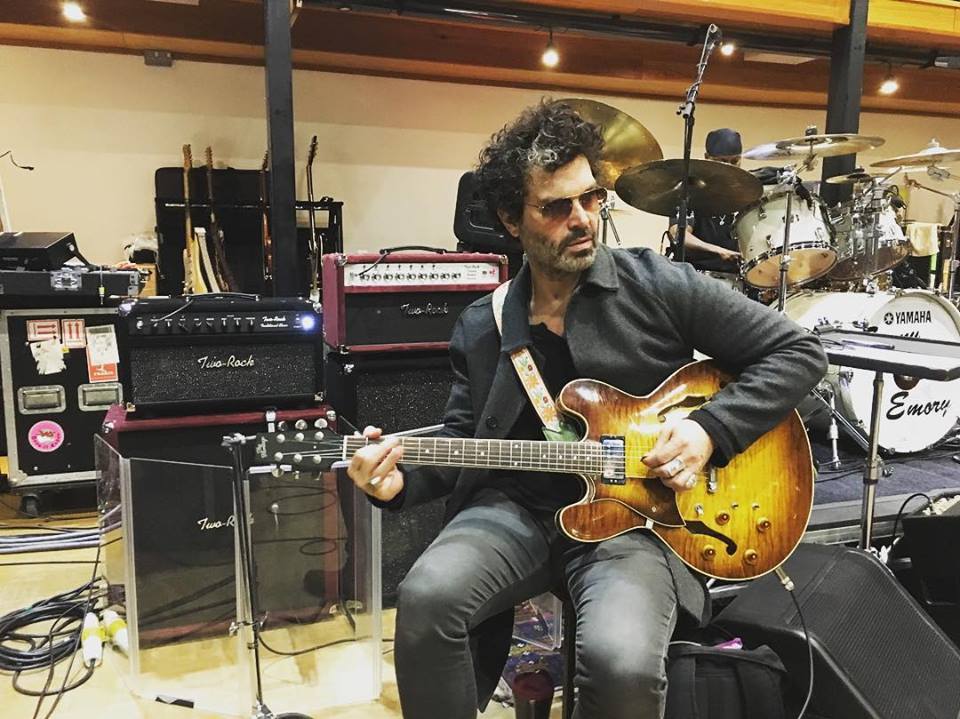 Doyle Bramhall II wielding his lefty H-535 during rehearsal with Eric Clapton.